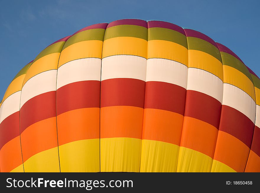 Colorful hot-air balloon with blue sky