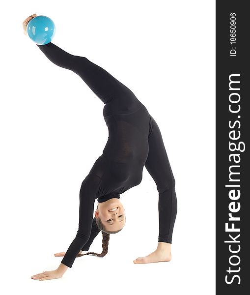 Studio photography of young professional gymnastic posing with blue boll  on white background. Studio photography of young professional gymnastic posing with blue boll  on white background