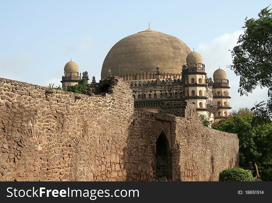 Gol Gumbaz seen behind the walls of nearby structure, Bijapur, Karnataka, India, Asia. Gol Gumbaz seen behind the walls of nearby structure, Bijapur, Karnataka, India, Asia