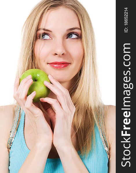 Portrait of lovely girl with green apple against white background. Portrait of lovely girl with green apple against white background