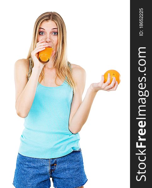 Lovely girl with orange drinking fresh juice, white background. Lovely girl with orange drinking fresh juice, white background