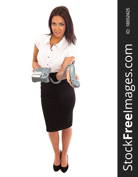 Business Woman in black skirt and white blouse holding out a telephone receiver. Business Woman in black skirt and white blouse holding out a telephone receiver