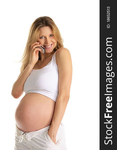 Happy pregnant woman with mobile phone isolated on white