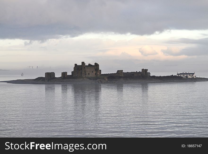 Castle on island, in the uk part of irish sea. Castle on island, in the uk part of irish sea