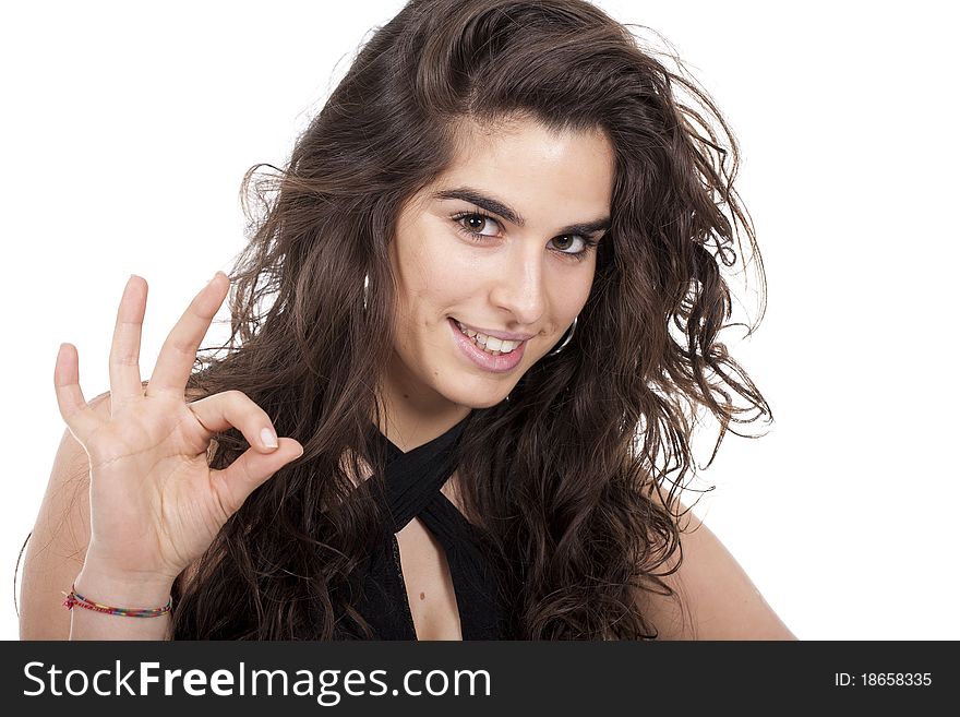 Beautiful woman with long and curly hair making ok sign. Beautiful woman with long and curly hair making ok sign