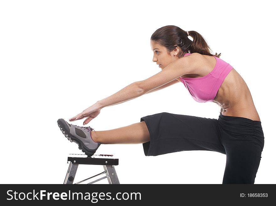 Beautiful and young fitness woman exercising
