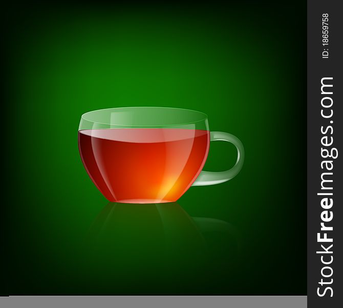 Transparent cup of tea on a green background