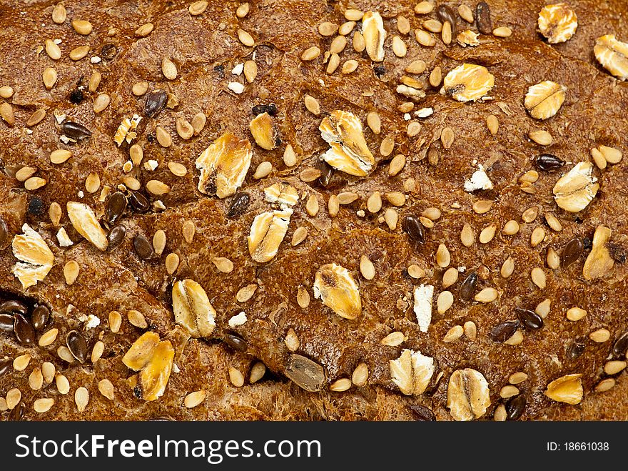 Close-up of bread surface with different seeds