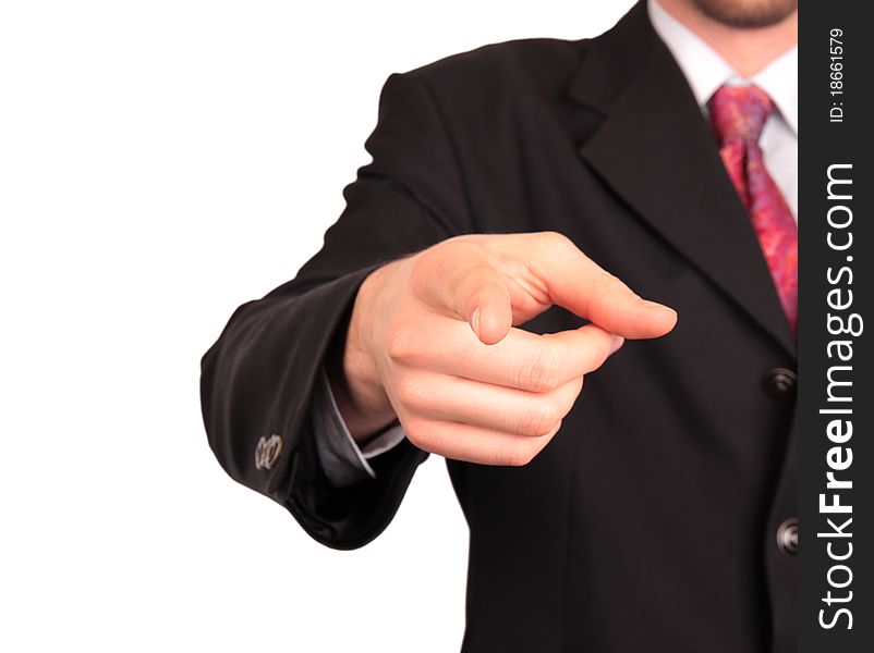 Businessman in suit and tie pointing the finger in front of himself