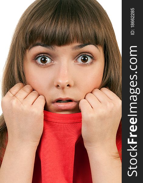 Portrait of the brunette in a red sweater isolated on a white background