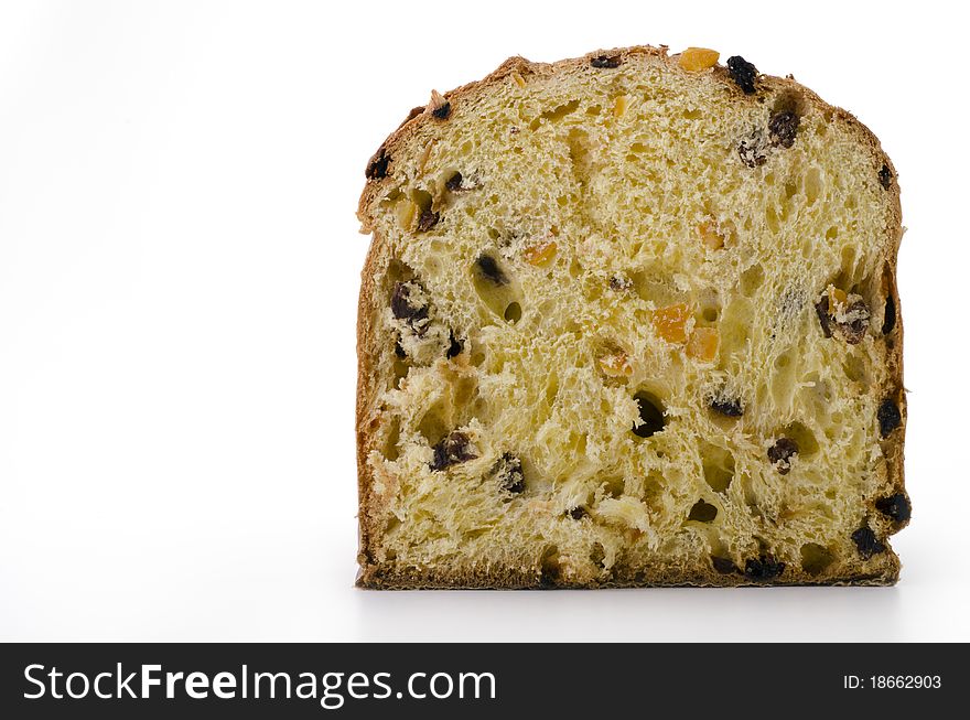 Panettone cut in half on a white background. Panettone cut in half on a white background