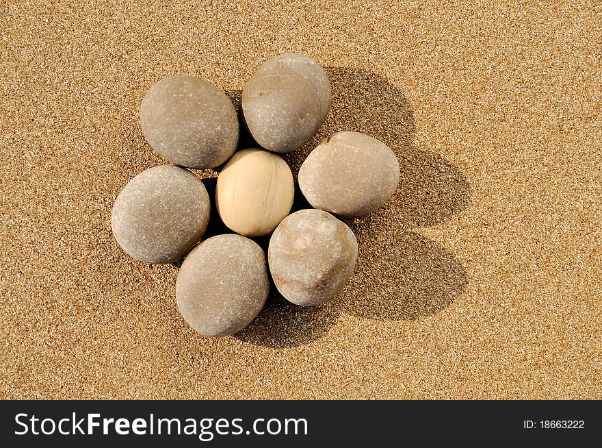 Beach stones,smooth by the waves. Concept of harmony,opportunities and alternative lifestyle. Beach stones,smooth by the waves. Concept of harmony,opportunities and alternative lifestyle.