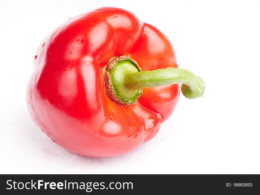 Red and wet pepper on white background. Red and wet pepper on white background