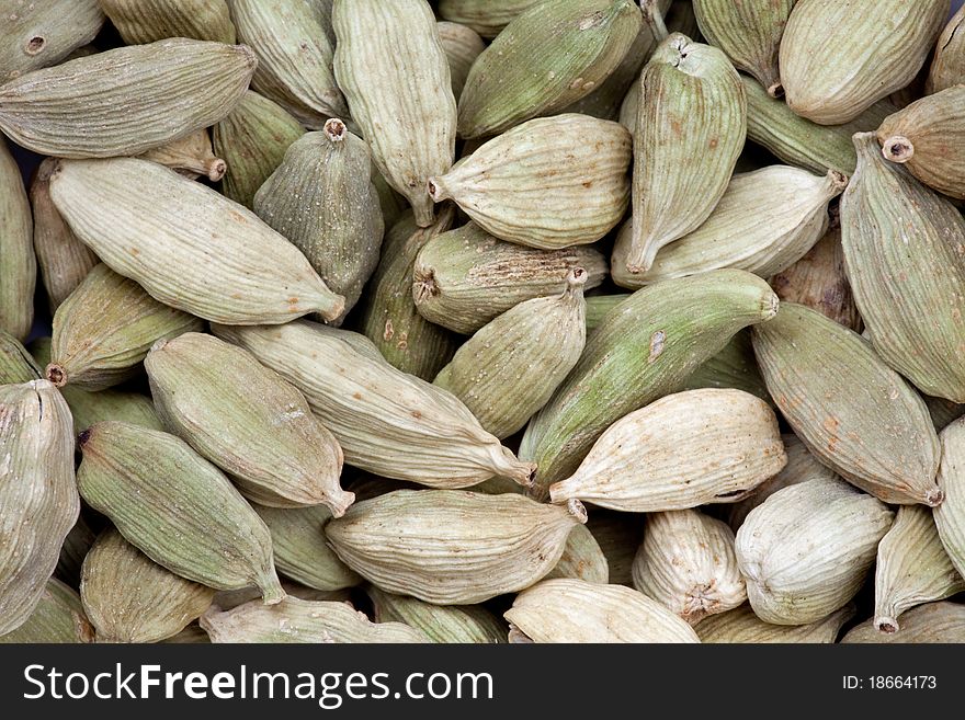 Cardamoms as whole background, macro shot