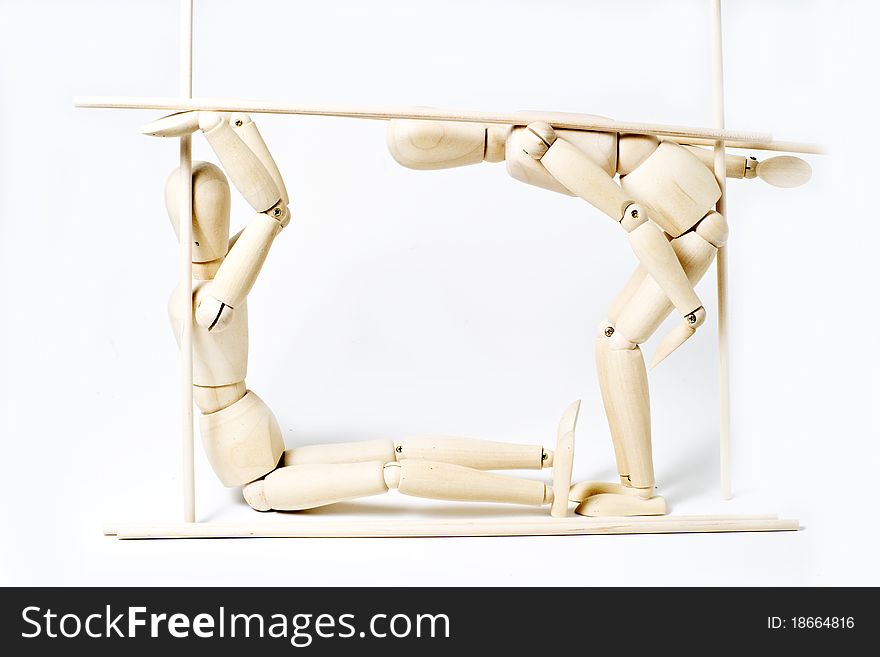 Figurines holding a square structure on white background