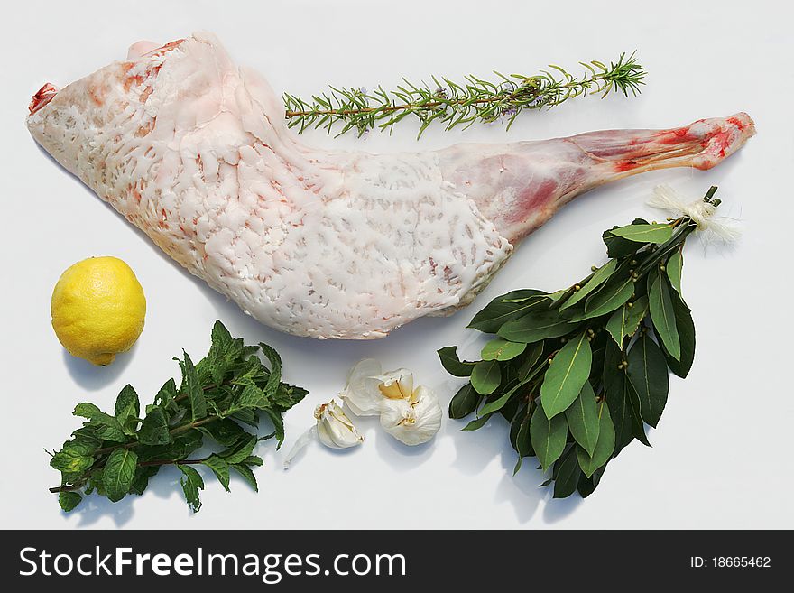 Leg and loin of lamb with herbs and lemon. Leg and loin of lamb with herbs and lemon