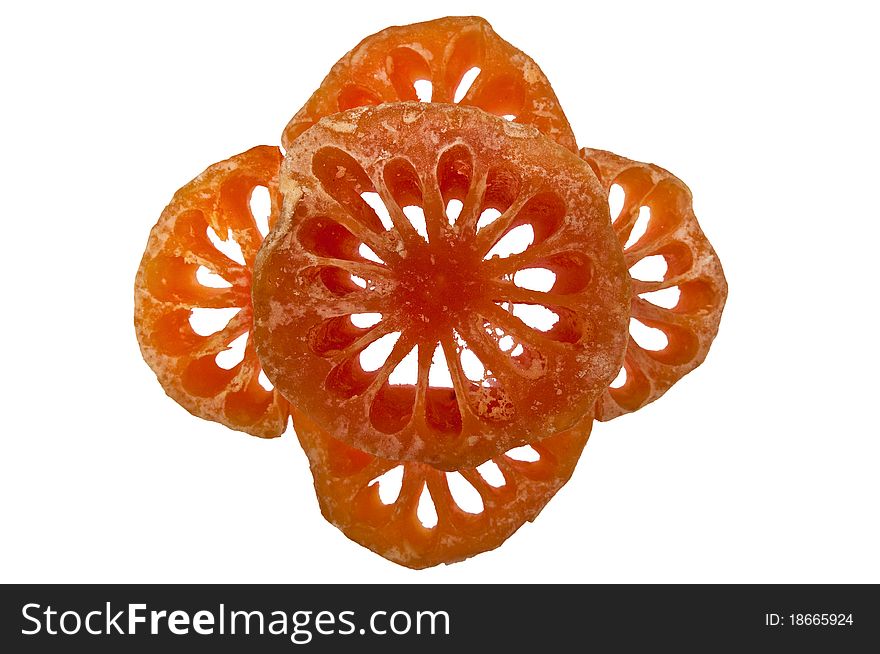 Slices of bael fruit on white background. Slices of bael fruit on white background.