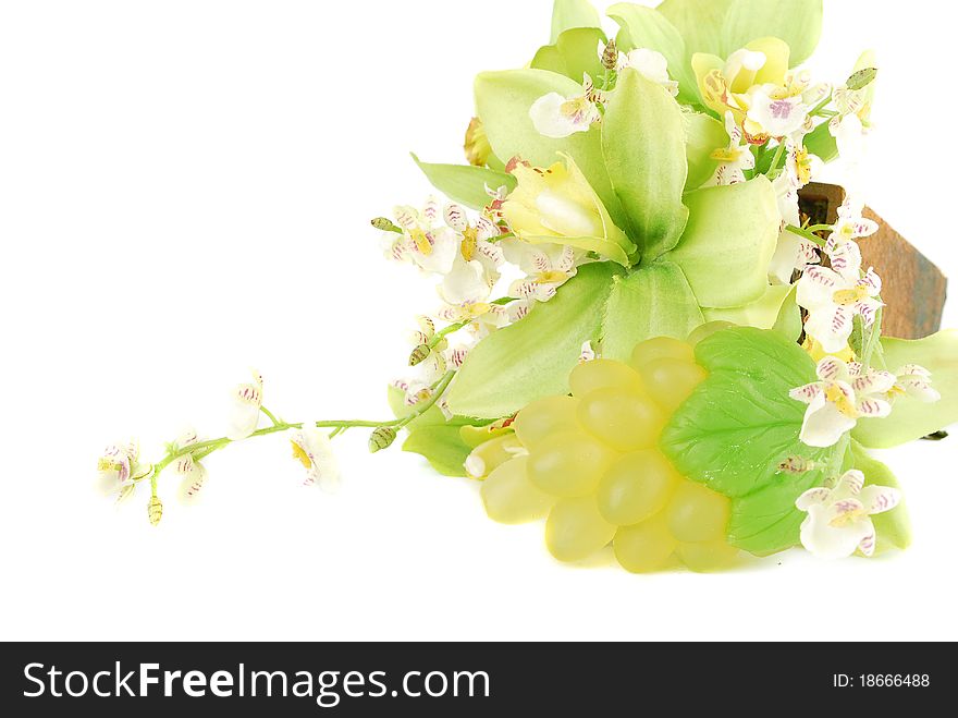 Natural green grape soap and orchid flower isolated on white background. Natural green grape soap and orchid flower isolated on white background.