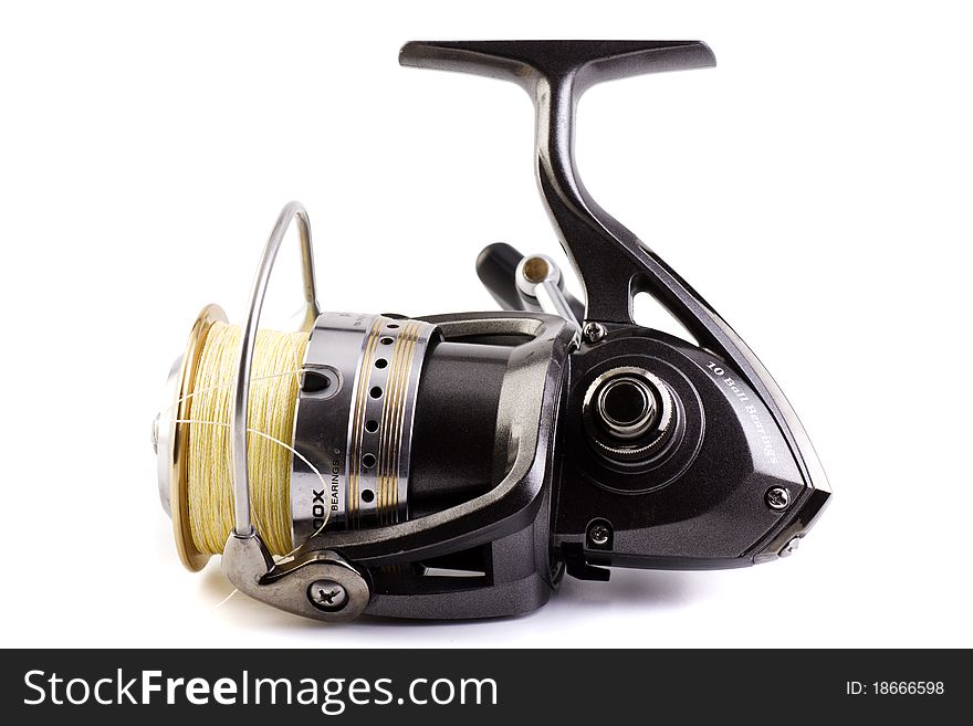 Black and Gold fishing reel isolated on white back ground