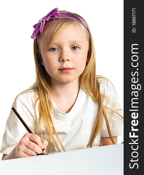 Adorable little girl drawing artwork. Studio shot