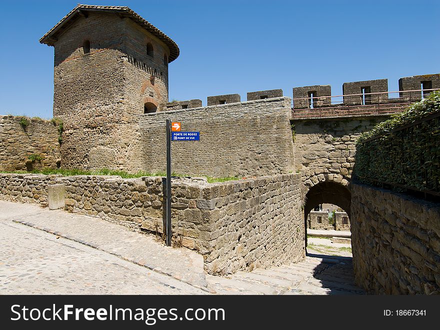 Carcassone is a fortified chateau in Aude south france. The picture showed tower,stone wal and gate. Carcassone is a fortified chateau in Aude south france. The picture showed tower,stone wal and gate.