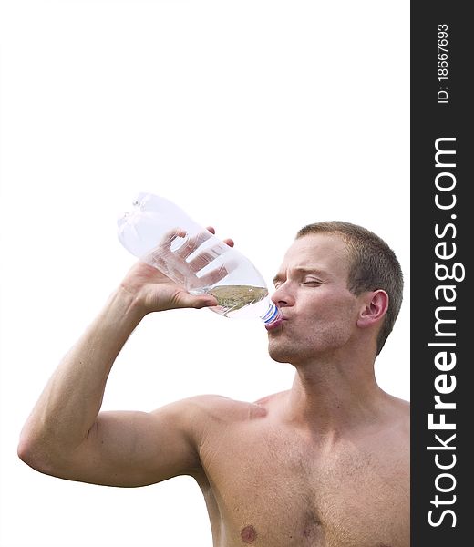 Muscular man drinking from a bottle of water