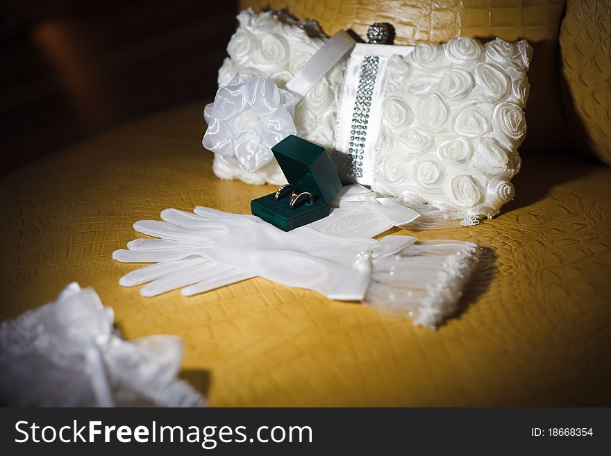 Gold wedding rings on the pincushion