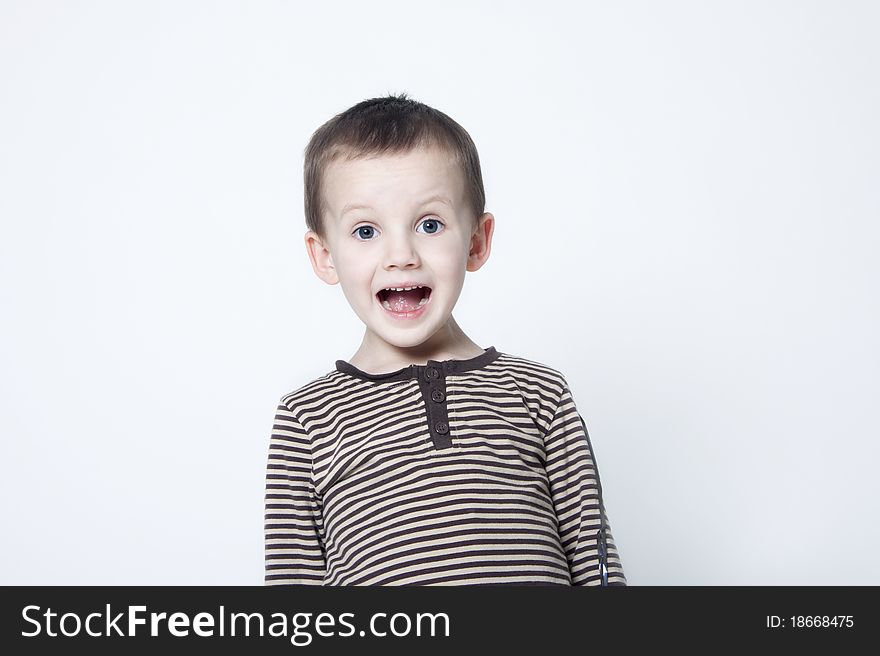Portrait Of Cute Surprised Boy