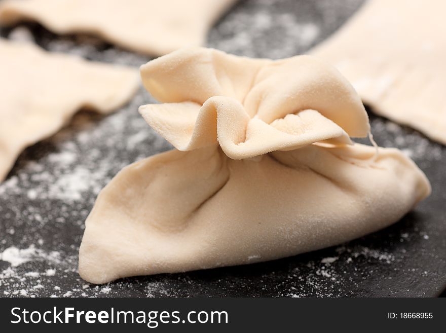 Raw pastry on a baking tray