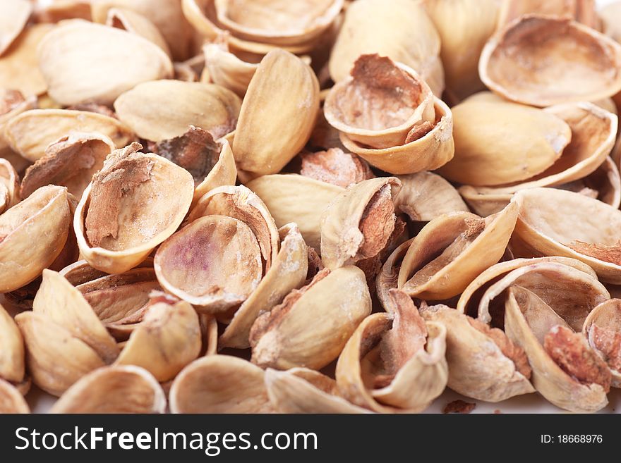 Closeup view of heap of pistachios nutshells. Closeup view of heap of pistachios nutshells.