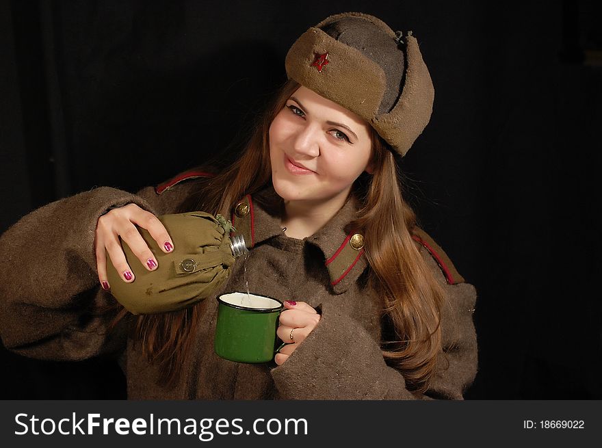 Beautiful girl wears Soviet military uniform