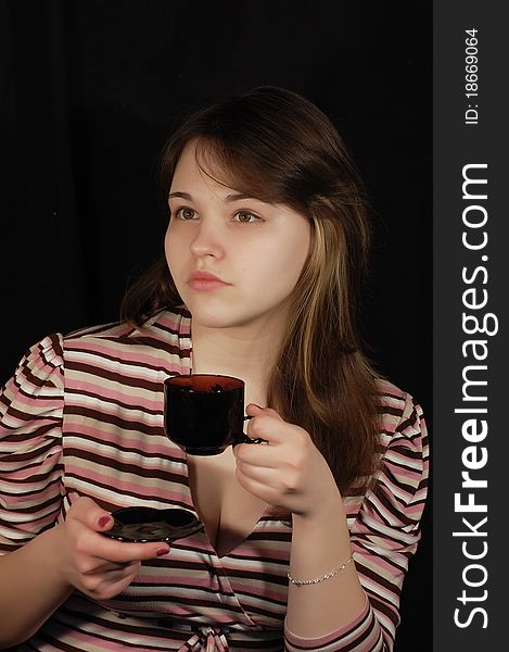 Beautiful teen girl with coffee cup