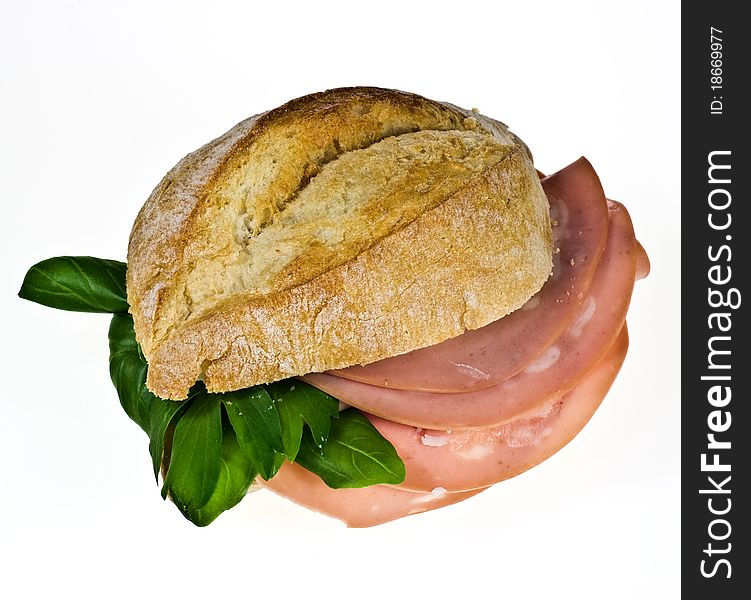 Ciabatta bread roll with mortadella and basil