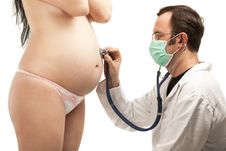Pregnant Being Examined By A Male Doctor Stock Images Pregnant Being Examined By A Male Doctor Stock Images