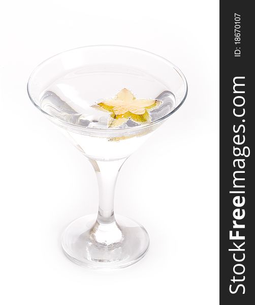 Cocktail with tropical fruit on white background.