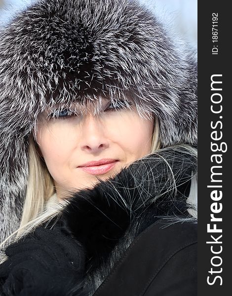 Beautiful woman in winter fur coat. Beautiful woman in winter fur coat