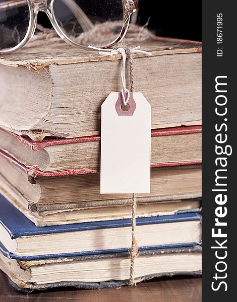 Archival documents in a book-depository are tied up by a cord. Archival documents in a book-depository are tied up by a cord.