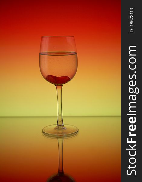 Glass and reflection on a red background