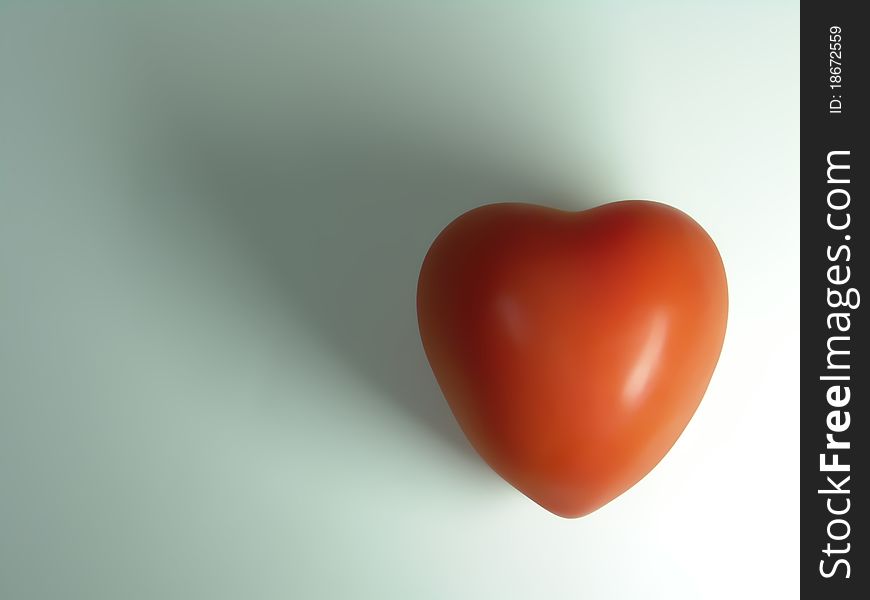 A close up shot of a red tomato that looks like a heart