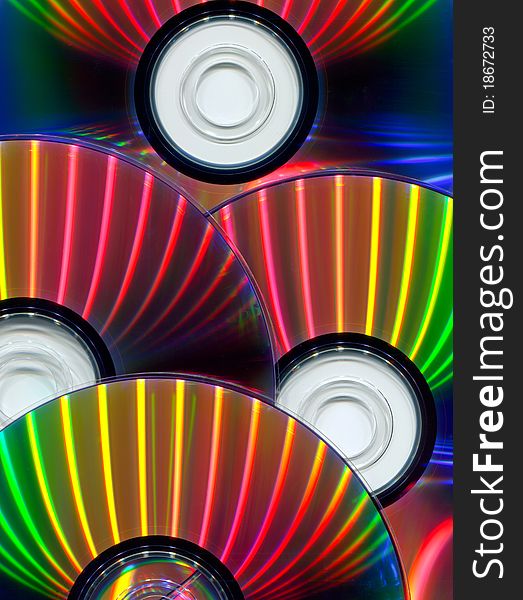 Close-up of CDs as background