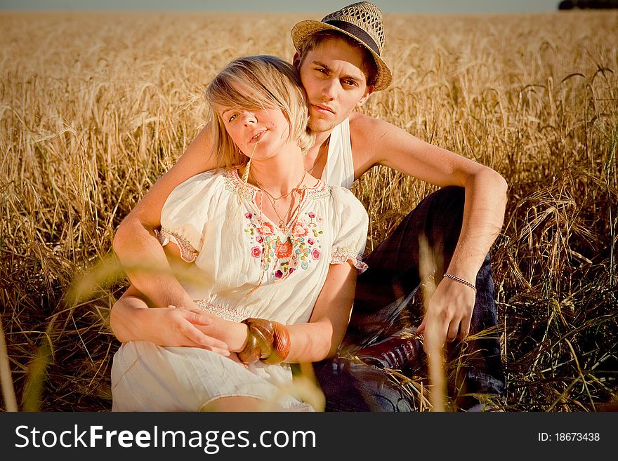 Image of young man and woman on wheat field