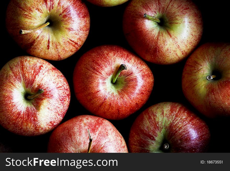 Group of apples on black background