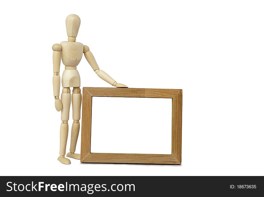 Wooden concept of mannequin in pose with wood frame. Wooden concept of mannequin in pose with wood frame