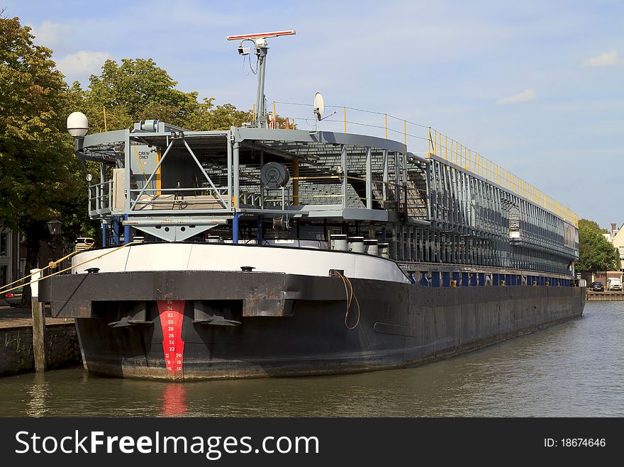 River liner used for transporting cars on the Maas docked in a harbour in Dordrecht