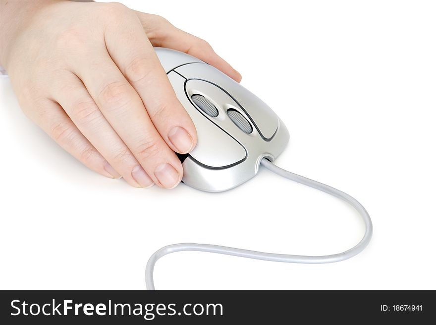 Computer mouse in hand of person and reflection