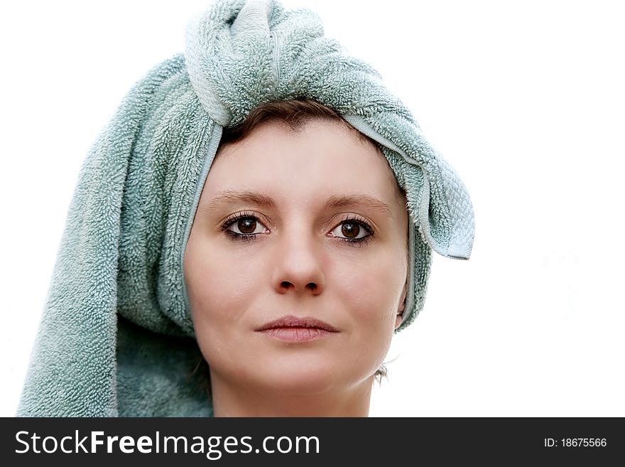 Beautiful woman with a towel on head