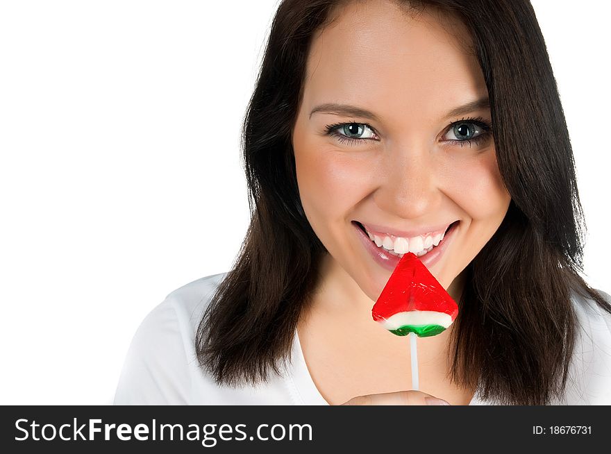 Pretty girl with candy on a white background