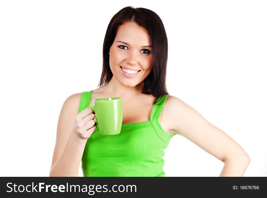 Pretty girl with a green cup  on a white background