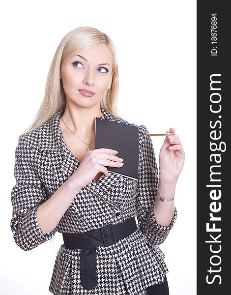 Positive woman with pencil and note smiling thinking over white background. Positive woman with pencil and note smiling thinking over white background