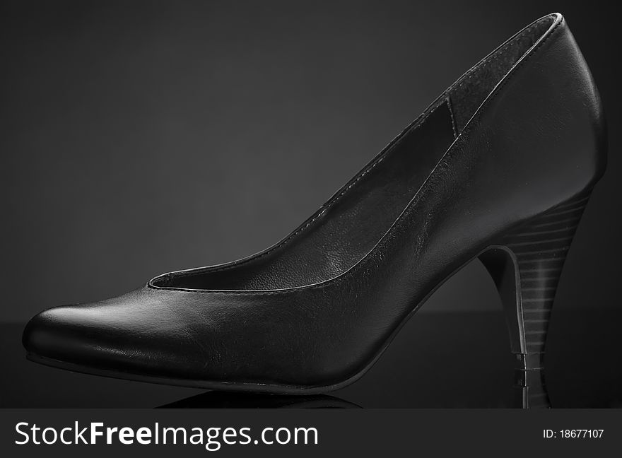 black shoes with gray background. black shoes with gray background